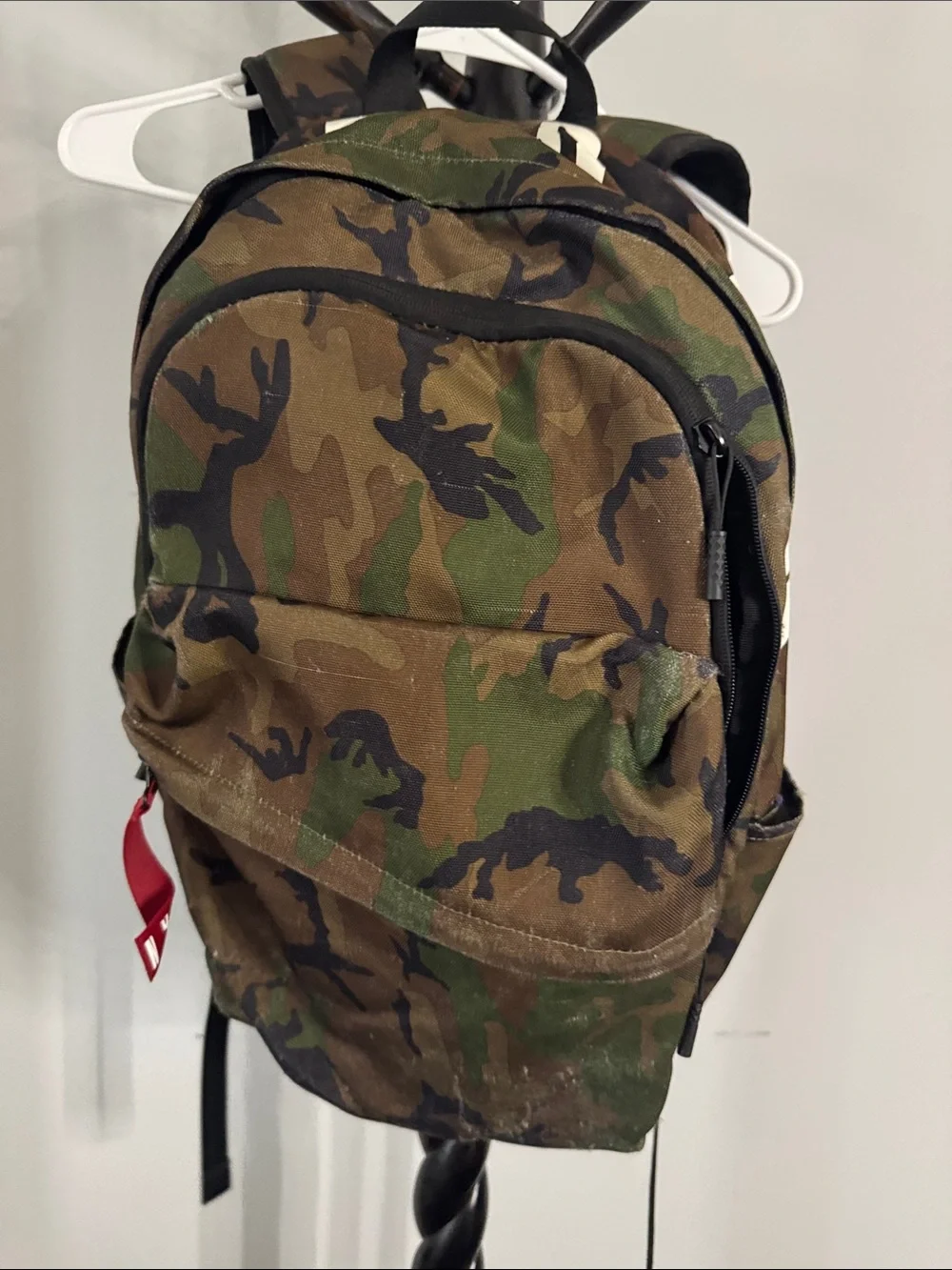 Camouflage Men's Backpack with Red Accent Pulls